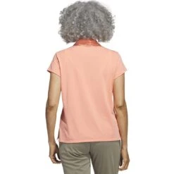 Adidas 2023 Women's Go-To Heathered Polo -Golf Shop adidas 23 womens go to heathered polo coral fusion back itempicture