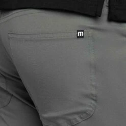 TravisMathew Open To Close Pants 41 TravisMathew Open To Close Pants -Golf Shop travismathew open to close pants basalm green logo itempicture
