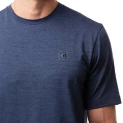 TravisMathew Scenic Vista Active Tee -Golf Shop travismathew scenic vista active tee heather blue logo itempicture